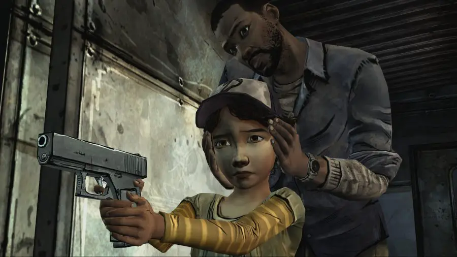 Lee du jeu The Walking Dead de Telltale montrant à Clem comment tirer avec une arme à feu