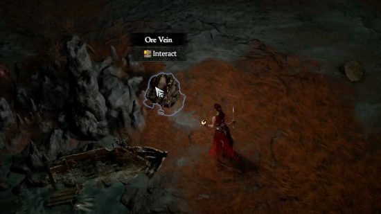 Ressources de Diablo 4 : Le joueur interagit avec une veine de minerai à l'état sauvage dans Sanctuary.