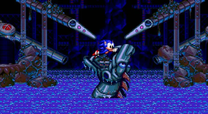 Sonic está tratando desesperadamente de no ser devorado por un dragón mecánico/monstruo marino con dos paletas de pinball sobre su cabeza en Sonic Spinball.