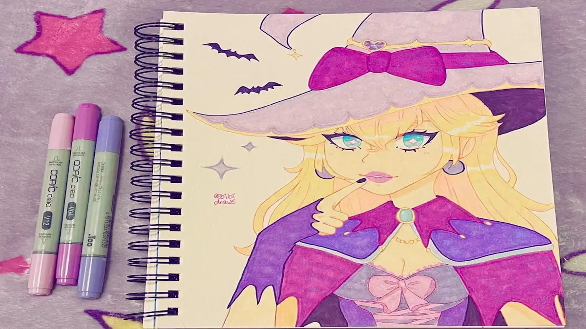 Umění princezny Peach s čarodějnickým kloboukem, fialovým pláštěm a rukavicemi, netopýry a jiskry kolem ní na zápisníku s fixy vedle